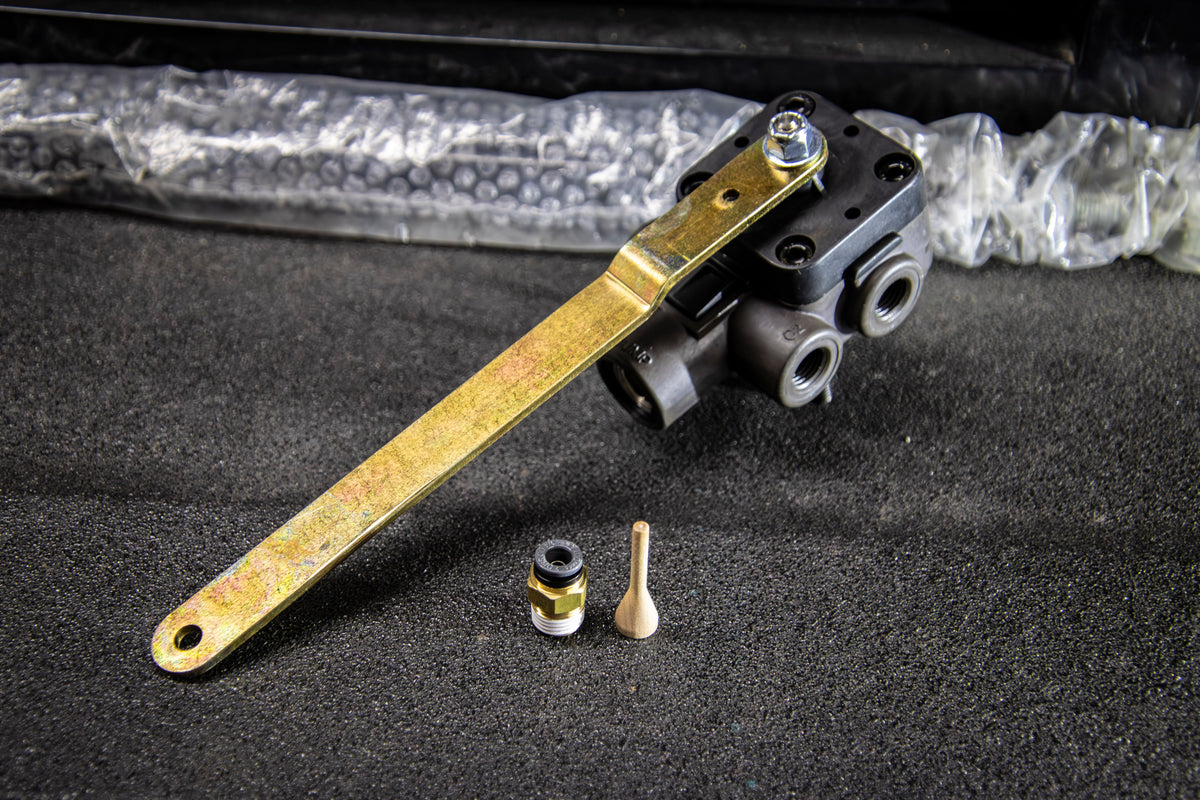 Ride height valve with dump