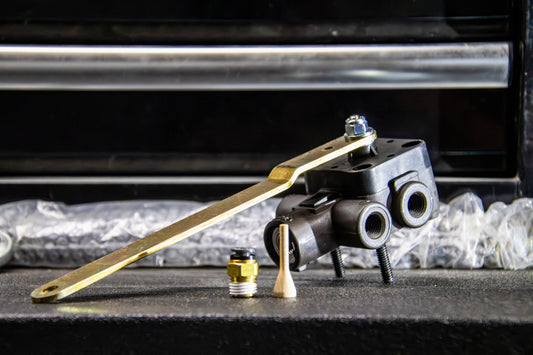 Ride height valve with dump